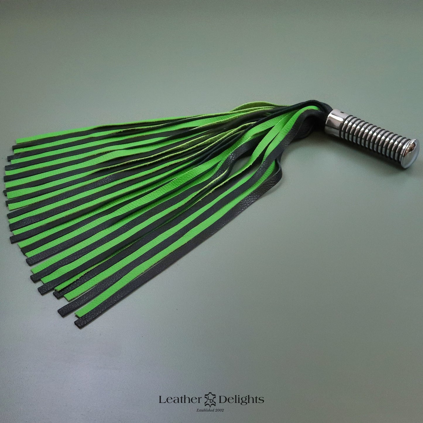 Green and Black Leather Flogger with Silver Handle