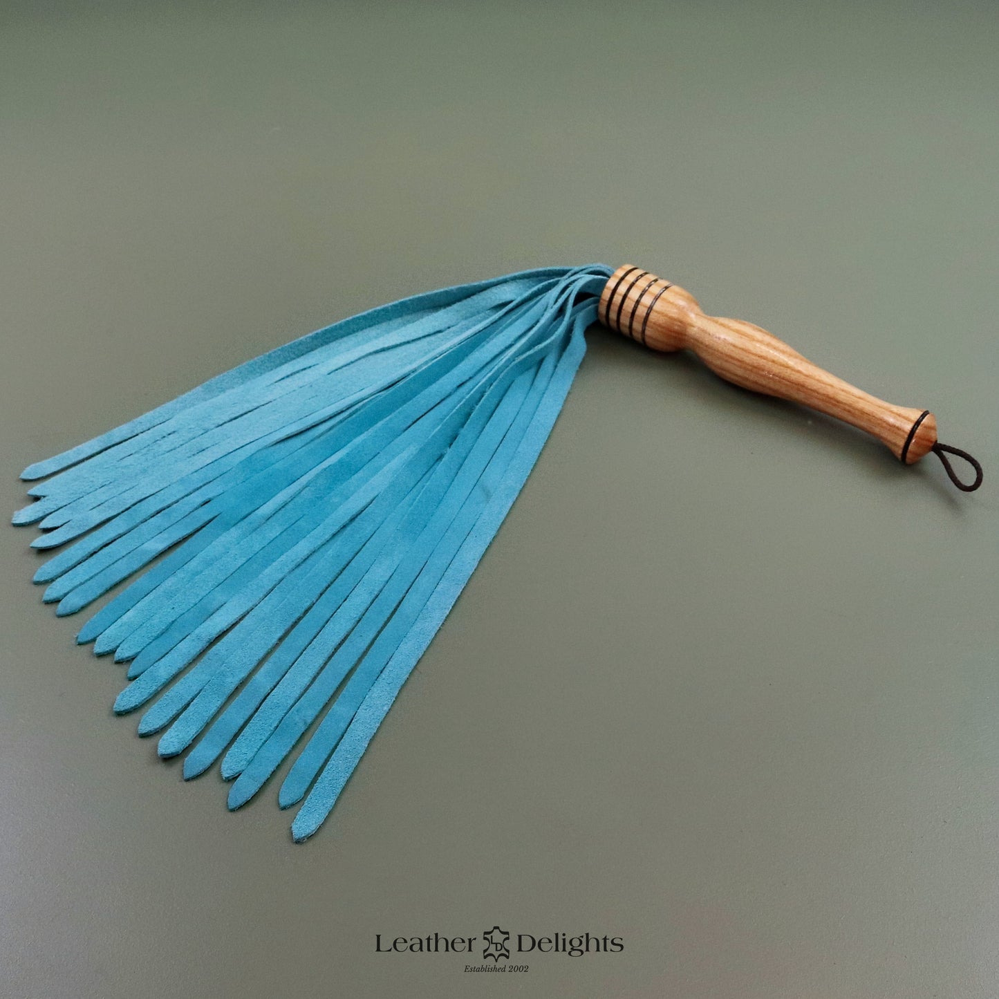 Turquoise Suede Flogger
